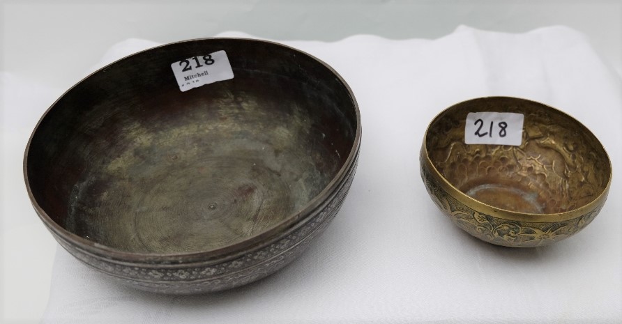 18th C silvered Indo Persian bowl, profuse script and figures & a 19th C Persian Brass Bowl, lion