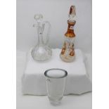 Cut Glass Decanter with amber panels, a cut glass ewer with decorative handle & an oval shaped glass
