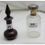 French engraved glass perfume bottle with a silver p & a brown hardsne perfume bottle, both 5”h (2)