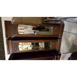 Two mirrored wardrobes with pediments and bevelled glass, each 19”w