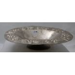 Ornate silver plated Centre Dish, raised on a plinth with decorative leaf and berry borders, 15”w