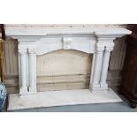 White Marble Fireplace, the inverted mantle over double Corinthian column side pillars, with a