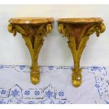 Pair of Gilt Wood Wall Brackets, red marbled backs, anthemion shaped supports, each 25”h