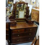 Walnut Dressing Table with a swivel mirror back over 5 drawers and 2 gallery drawers, 42”w