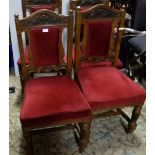 Set of 4 Edw. Oak Dining Chairs with heavy carvings, turned legs, red velour covered padded seats