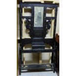 Carved Oak Hallstand, with mirrored back, hanging hooks, 40”w