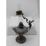 Late 19thC Silver Plated “Genie Oil Lamp”, decorated with mask of roman man, fluted sides, glass