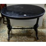 Oval Ended Ebonised Centre Table with brass beading, turned stretcher, 36”w