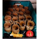 Large group of terracotta mugs, with painted designs (in box)