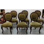 Matching Set of 6 French Mahogany Dining Chairs, the oval shaped padded backs and eats covered