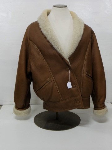 Lady’s Sheepskin Coat, brown leather outer with an Icelandic lambskin shearling lining, by Conder of