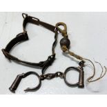 Pair of antique hand cuffs, metal neck chain, ball with hook (3)