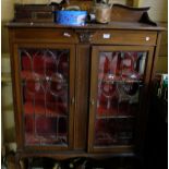 1950s mahogany 2 door display cabinet on Queen Anne legs (back leg damaged), 43"w and a 2 door glass