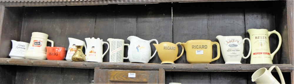 Shelf of Advertising Water Jugs – Ricard, Haig, Bells etc