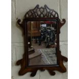 Queen Anne style mahogany framed wall mirror with fretwork design top, 20"w x 29"h