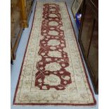Afghan Ziegler Wool Floor Rug /Runner, cream ground with central red pattern and borders, 3.51 x 0.