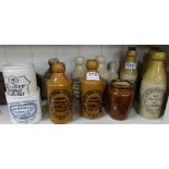 12 x Stoneware bottles/jars, "The Doctor's Stout", 4 x "Thwaites, Dublin", 2 x "Keiller" etc