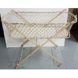 Victorian iron framed bassinet, painted cream, folding, 43"l x 20"w