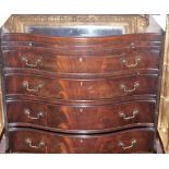 Mahogany chest of drawers with serpentine front and sliding tray, Chinese Chippendale borders,