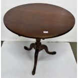 Georgian mahogany tilt-top occasional table, on a tripod base, pad feet, 31"dia