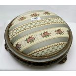 Tapestry footstool, 12” diameter, with a carved grey painted base on 3 bun feet