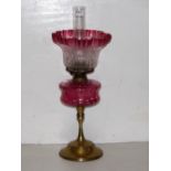 Victorian Table Oil Lamp, brass base, red glass bowl and a tulip shaped red tipped shade, 24”h