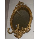 19thC Giltwood Wall Mirror with 3 carved sconces, in an ornate carved frame, 36”h
