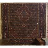 Blue ground Persian Carpet with an all over sennodash design, 2.87m x 2.0m