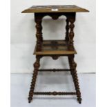 Walnut 2-tiered occasional table with a carved top and centre, bobbin twist legs and stretchers, 17"
