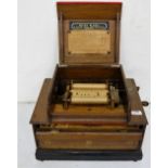 Musical Seraphone, in mahogany case, stamped Peter Black, Manchester, with directions for playing (