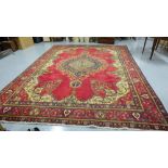 Large red ground Persian Tabriz Carpet, traditional floral medallion design, 3.93m x 3m