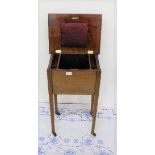 Edw. Sewing Box, on tapered legs, a hinged lid enclosing padded compartment, 15” w x 26”h