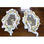 Pair of Decorative Porcelain Framed Wall Mirrors, floral applied borders, with cherubs, 11” x 18”h