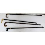 4 x Walking Sticks, one 36" with silver ringed "horn" crook, 2 x 35", one silver ringed crook, one