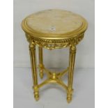Circular Occasional Table, painted gold with a beige marble top, 19” dia