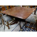 Mahogany Centre Table on a pod with 4 splay legs, brass toes, 44” x 42” p