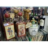 9 spirit bottles – some painted with military scenes, old Moet Magnum, two bottles bottles of (un-