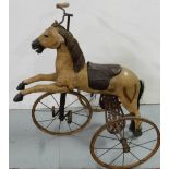 19th C Child’s Pedal Horse, 3-wheeler, on decorative iron base, 33” x 36”