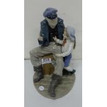 Lladro table ornament, young boy with fisherman, 11"h