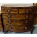 Georgian bowfront mahogany chest of drawers, crossbanded inlaid top, circular brass handles, sabre
