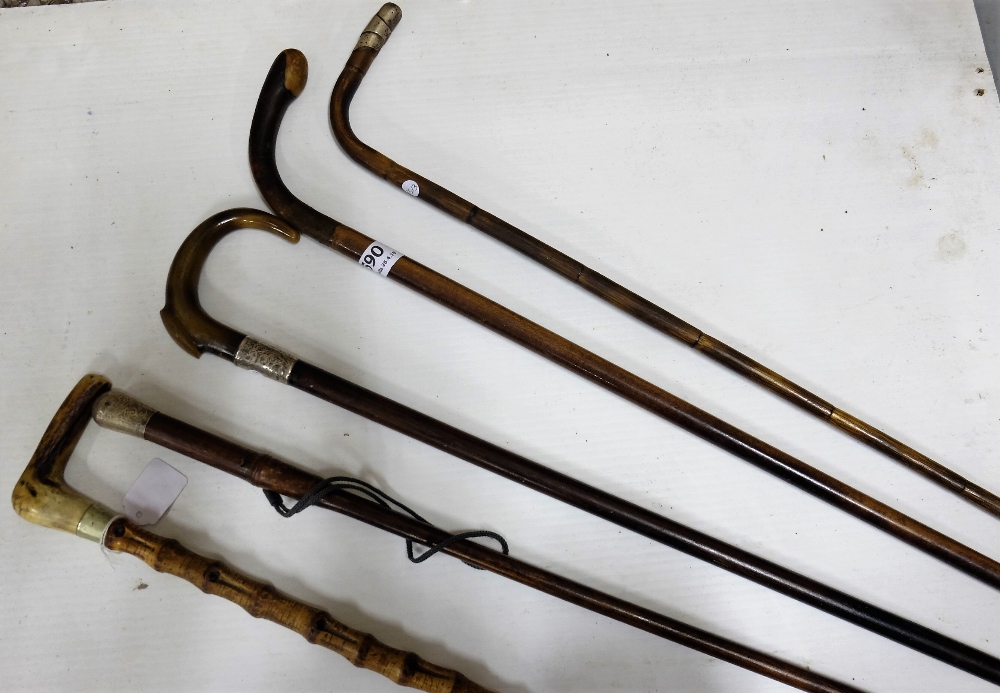 5 x Walking Sticks, one silver topped crook, 35”, one bone handle with silver band, 35” and three