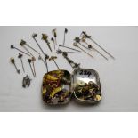 Assorted group of hat/tie pins & an assortment of cufflinks