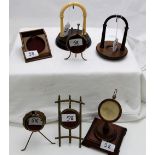 7 Pocket Watch Stands, brass and wooden frames