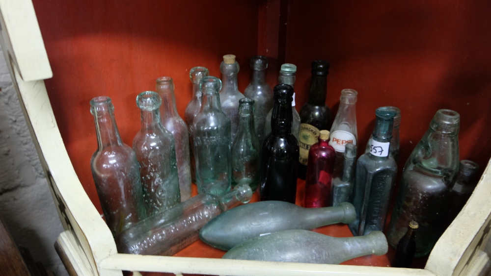 9 x Irish clear glass bottles and other English bottles etc