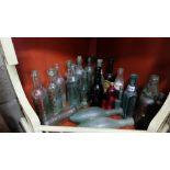 9 x Irish clear glass bottles and other English bottles etc