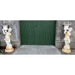 Matching Pair of Tall Metal Garden Pots, supported by Cherubs, painted white, each 54”h