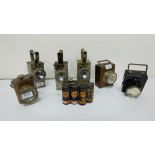 6 battery operated carbide lamps & a set of Ever Ready battery