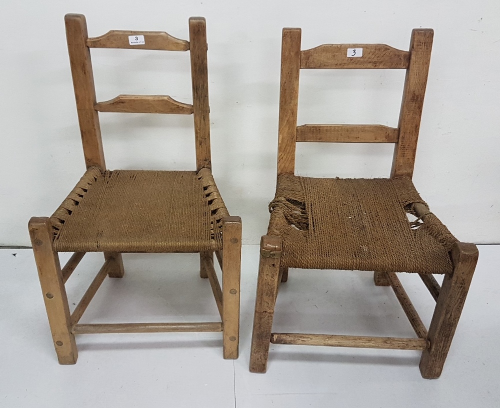 Two similar Irish Pine Sugan Chairs (2)