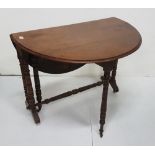 Drop Leaf Walnut Sutherland Table, turned legs, oval ends, 34”w (extends to 40”)