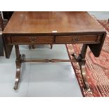 Regency style Mahogany Sofa Table with two apron drawers, on 4 splayed legs, brass toes and castors,